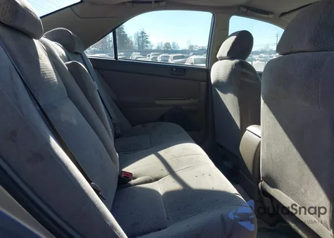 2002 Toyota Camry Le from USA, damaged, VIN 4T1BE32K52U039197